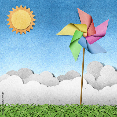 Illustration: windmill on grass recycled papercraft background windmill on grass recycled papercraft background