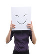 asian girl holding cardboard