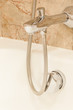 Faucet with handles and white bath