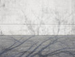 Foto: Sichtbeton mit Pflaster und Schatten Sichtbeton mit Pflaster und Schatten