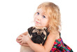 isolated portrait of pretty girl hugging pug dog on white