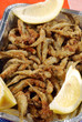 A basket of tasty fried fish A basket of tasty fried fish