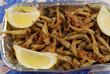 A basket of tasty fried fish A basket of tasty fried fish
