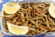 A basket of tasty fried fish A basket of tasty fried fish