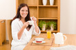 Breakfast at home happy woman with coffee Breakfast at home happy woman with coffee