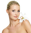 Beautiful woman with white flower