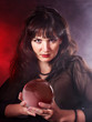Young woman  with crystal ball.