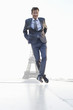 Businessman jumping with the Eiffel Tower in the background, Paris, Ile-de-France, France
