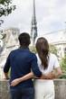 Photo: Romantic couple with Notre Dame de Paris in the background, Paris, Ile-de-France, France Romantic couple with Notre Dame de Paris in the background, Paris, Ile-de-France, France