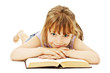 Little girl lieing on the floor and reading book
