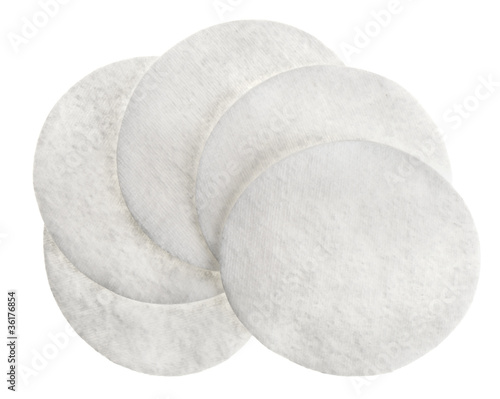 Photo: Cotton round cosmetic pads, isolated on white Cotton round cosmetic pads, isolated on white