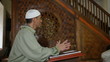 Imam preaching in a mosque