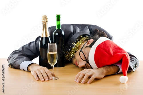 Photo: Drunken businessman after office christmas party Drunken businessman after office christmas party