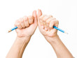 hand with broken pencil