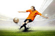Foto: Football player on field of stadium Football player on field of stadium