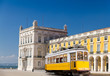 Lisbon yellow tram at central square Praca de Comercio, Portugal Lisbon yellow tram at central square Praca de Comercio, Portugal