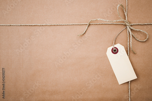 Photo: brown paper parcel with copy space brown paper parcel with copy space