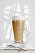 coffee latte with frothy milk in tall glass coffee latte with frothy milk in tall glass