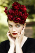 Woman with red lipstick and flowers on the head