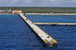 Cruise ship long pier at a western caribbean port Cruise ship long pier at a western caribbean port