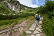 Backpacker girl exploring the mountains.