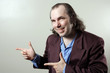 Confident salesman pointing