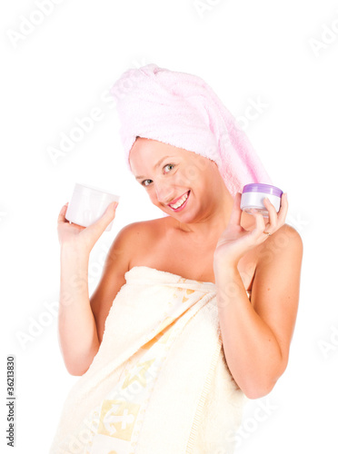 Photo: Beautiful woman tender jar of moisturizer cream. Beautiful woman tender jar of moisturizer cream.
