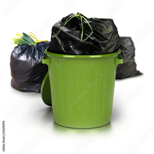 Foto: green garbage can over a white background green garbage can over a white background