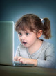 Foto: Little girl with laptop Little girl with laptop