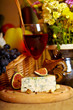Wine and cheese still life