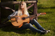 Blonde guitar woman