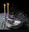 festive place setting and candlelight