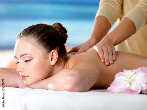 Photo: Spa massage for young beautiful woman Spa massage for young beautiful woman
