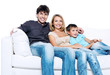 Happy young family with pretty child