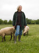 A farmer with sheep