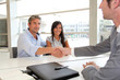 Man giving handshake to real-estate-agent