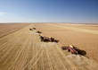 Foto: Four Combines in Field Four Combines in Field