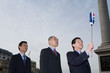 businessmen with umbrella 