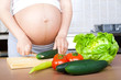 Pregnancy and nutrition - pregnant woman with vegetables Pregnancy and nutrition - pregnant woman with vegetables