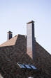 Roof and pipe of a modern apartment house in suburban settlement Roof and pipe of a modern apartment house in suburban settlement