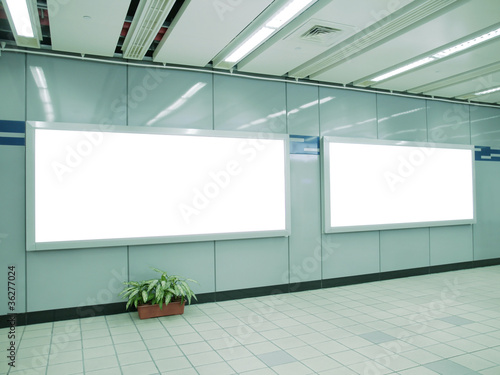 Photo: Blank billboard in underground passage Blank billboard in underground passage
