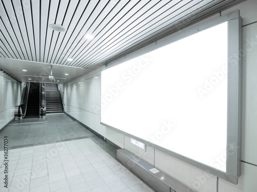 Photo: Blank billboard in underground passage Blank billboard in underground passage