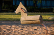 Swing is a wooden horse in the park.Clipping path included.