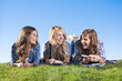 Photo: Fun-loving and laughing women playing outside together Fun-loving and laughing women playing outside together