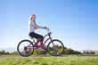 Photo: Beautiful Young Woman on a bike ride Beautiful Young Woman on a bike ride