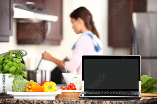 Photo: cooking and computer laptop concept cooking and computer laptop concept
