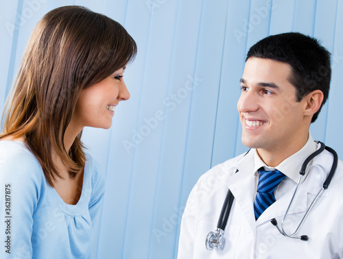 Foto: Doctor and patient at office Doctor and patient at office