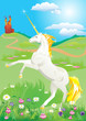 White unicorn rearing up on its hind legs on beautiful meadow