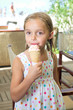 Cute little girl eating icecream