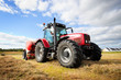 tractor collecting haystack in the field,panning technique